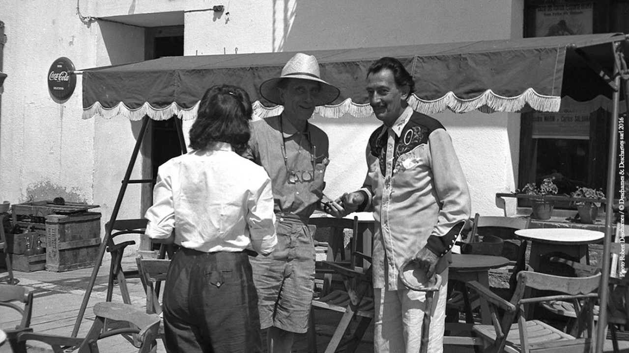Robert Descharnes, Marcel Duchamp with Gala and Salvador Dalí outside the Bar Melitón. Cadaqués, August 1958