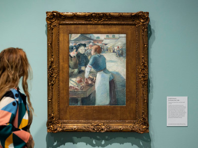 Installation view of 'Impressionists on Paper: Degas to Toulouse-Lautrec' at the Royal Academy of Arts, London, 25 November 2023 – 10 March 2024,  showing ‘The Market Stall’, 1884, by Camille Pissarro. 