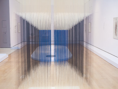 An installation view of 'Radical Geometry at the RA'. Jesús Soto, Nylon Cube, 1990.