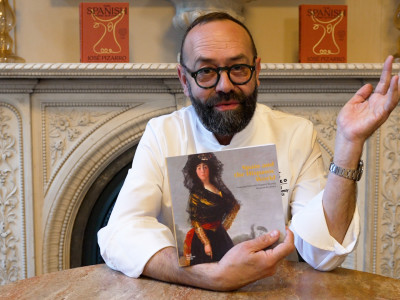José Pizzaro with the catalogue for 'Spain and the Hispanic World'