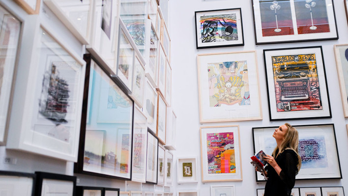 Guest enjoying a preview of the Summer Exhibition