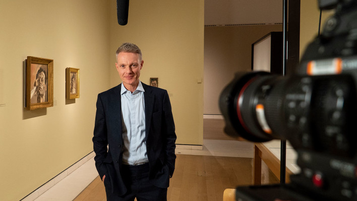 The RA's Artistic Director, Tim Marlow, being interviewed in 'Lucian Freud: The Self-portraits' at the RA