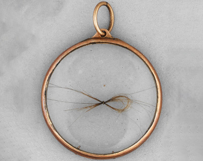 Crystal locket containing a lock of Napoleon's hair