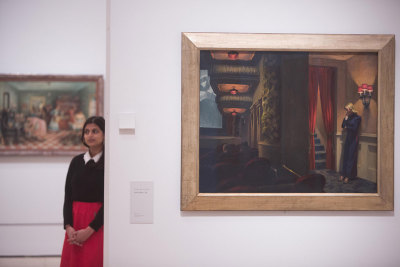 Installation image of ‘America after the Fall: Painting in the 1930s’ at the Royal Academy of Arts, London, showing 'New York Movie' by Edward Hopper