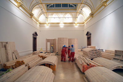 A team of workers assemble Pezo Von Ellrichshausen's installation in 'Sensing Spaces'