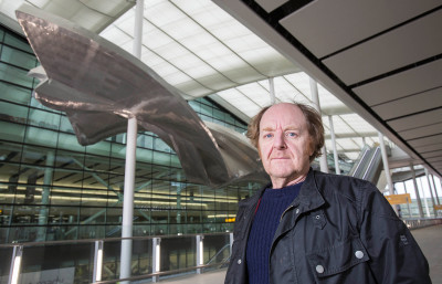 Richard Wilson RA with his sculpture Slipstream at Heathrow's new Terminal 2 The Queen's Terminal.