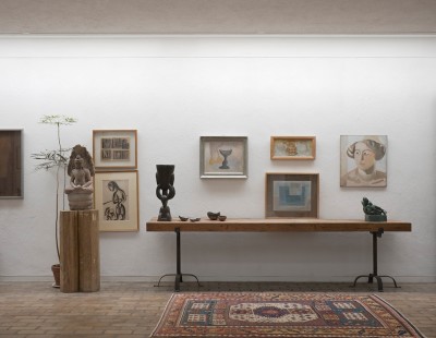 View of Kettle's Yard extension showing the Buddha and works by Mario Sironi, Henri Gaudier-Brzeska and Ben Nicholson