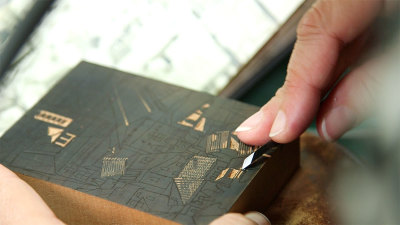 Anne Desmet RA works on her wood engraving 'San Severino Marche'