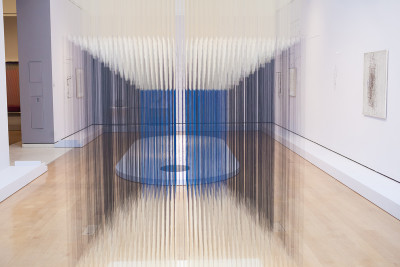 An installation view of 'Radical Geometry at the RA'. Jesús Soto, Nylon Cube, 1990.