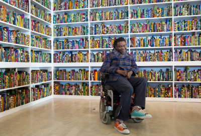 , Yinka Shonibare RA in front of his work The British Library