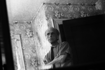 Joseph Cornell poses for a portrait in 1967 at his home and studio in Flushing, Queens, New York
