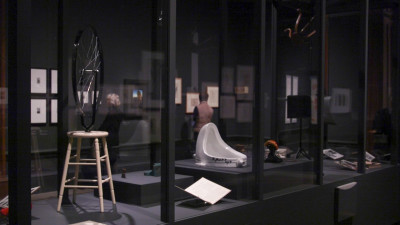 Installation view of the Dalí / Duchamp Exhibition at the Royal Academy of Arts, showing 'Bicycle Wheel' and 'Fountain' by Marcel Duchamp