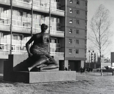 Henry Moore’s ‘Draped Seated Woman’ (1957-58) in its original site at Stifford Estate, Stepney Gren, c.1962