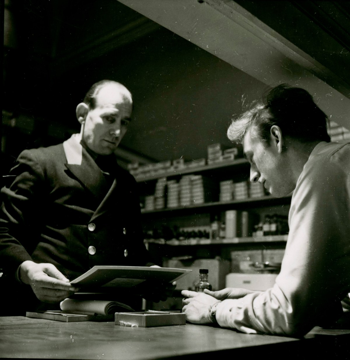 Russell Westwood, George White, the School's Porter talking to 'Darcy' Smith, a student.