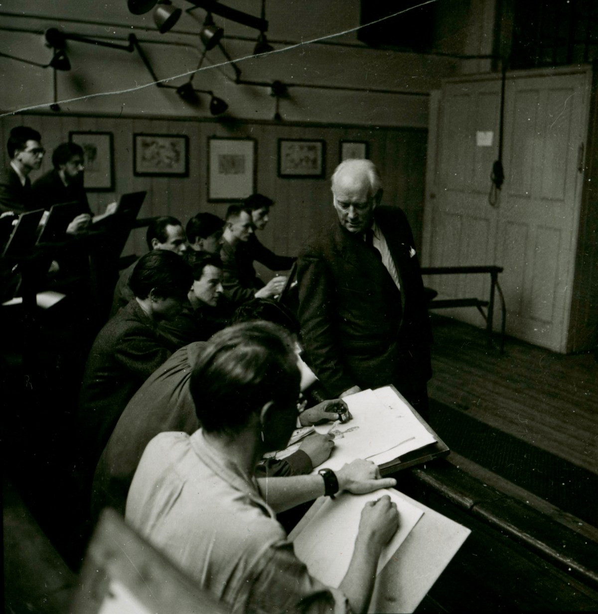 Russell Westwood, Sir Henry Rushbury with students, the Life Room, Royal Academy Schools, 1953.