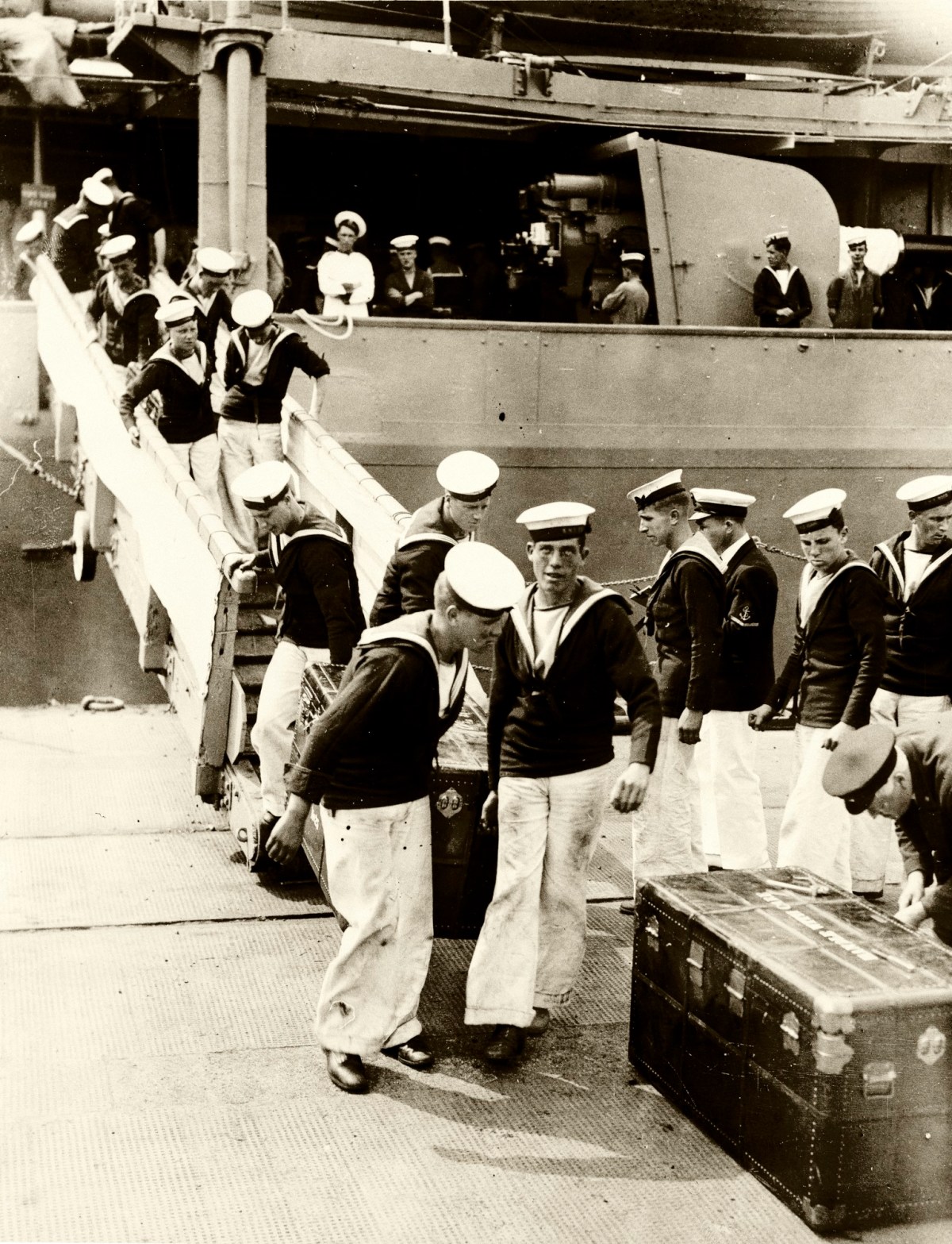 Unidentified photographer, The crew of H.M.S. Hood unload cases at Portsmouth, July 1935. The International Exhibition of Chinese Art at the Royal Academy 1935-6. Photograph by an unknown photographer from Topical Press Agency