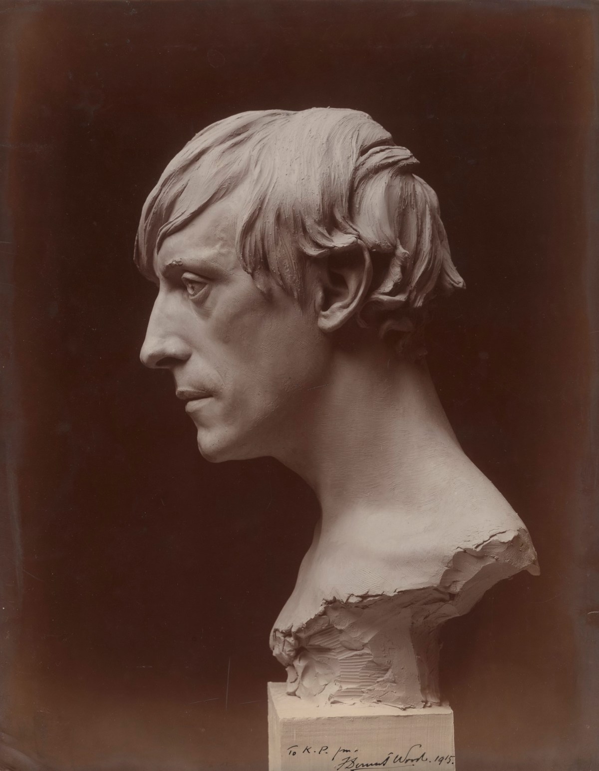 , A collection of 12 monotone photographs of sculpture by Francis Derwent Wood R.A.