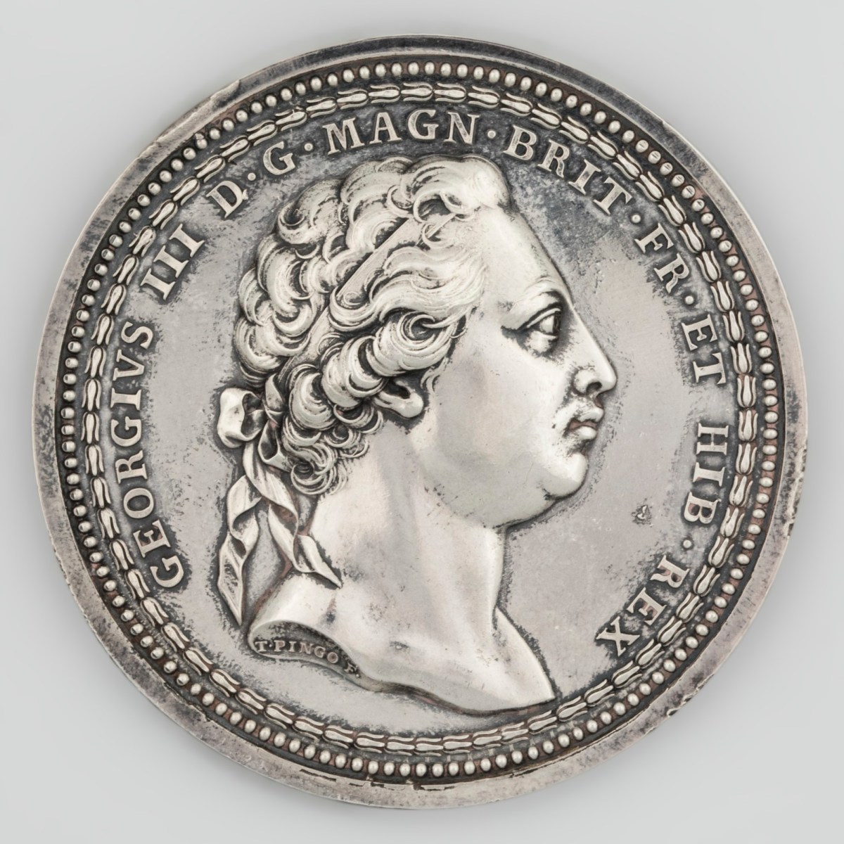 Mr T. Pingo and Giovanni Battista Cipriani RA and Edward Penny RA, Royal Academy Schools, silver medal presented to Sydney Smirke for a drawing from a public building (1817)