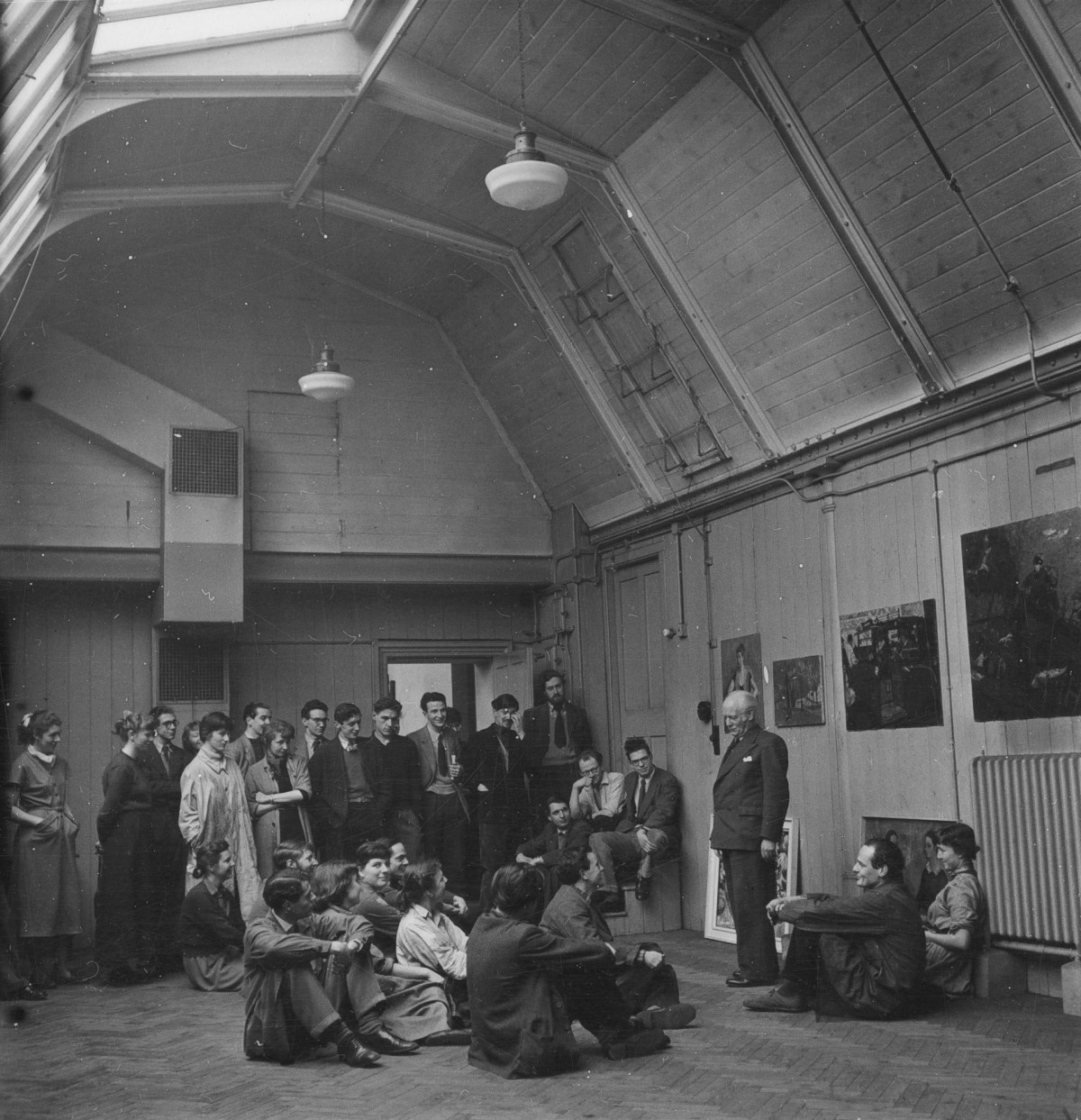 Russell Westwood, Sir Henry Rushbury R.A. talking to students in the Royal Academy Schools, 1953.