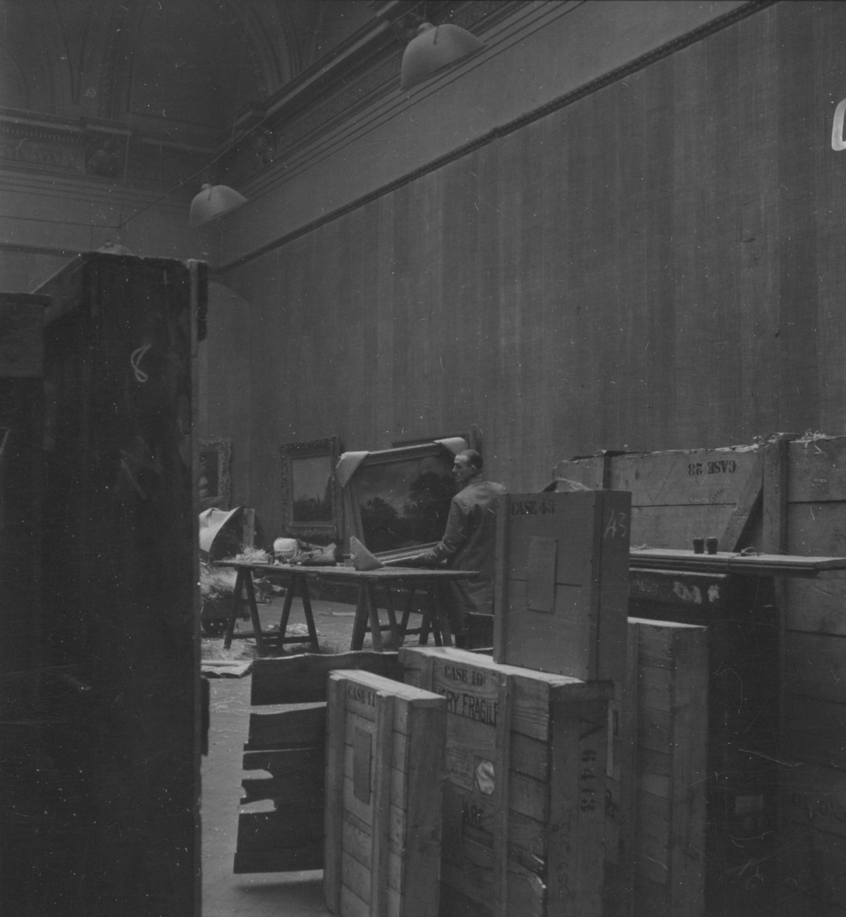 Russell Westwood, De-installing an exhibition in the Main Galleries, Burlington House, 1953.