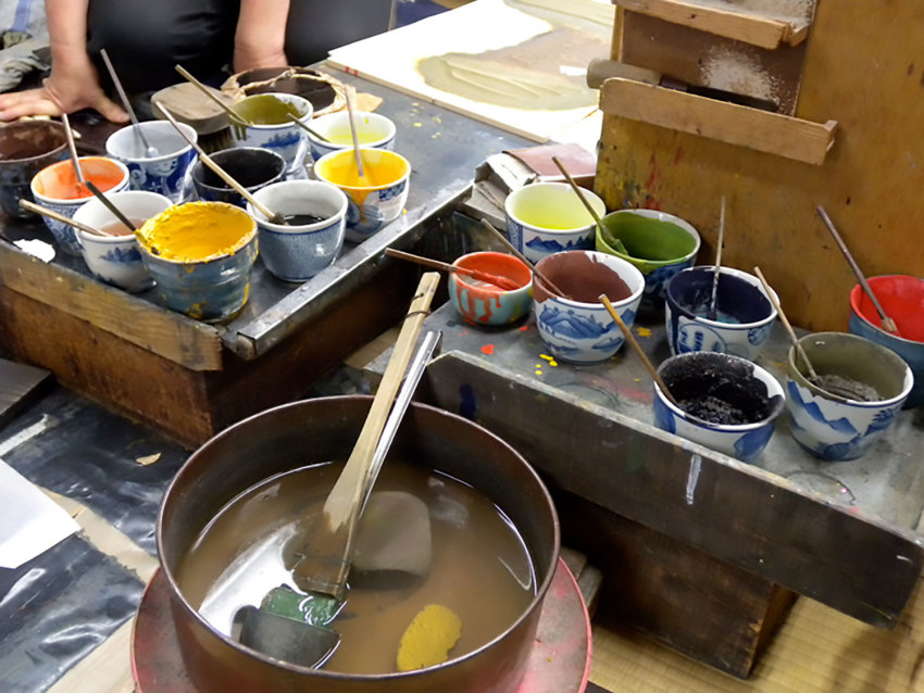 Pots of colour are lined up ready for printing