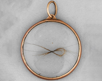 Crystal locket containing a lock of Napoleon's hair