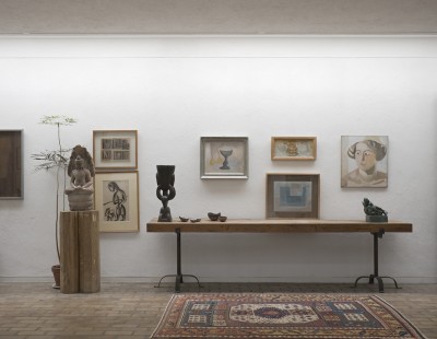 View of Kettle's Yard extension showing the Buddha and works by Mario Sironi, Henri Gaudier-Brzeska and Ben Nicholson