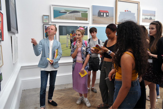 Print Tutor Simon Oldfield leading a tour of the Summer Exhibition